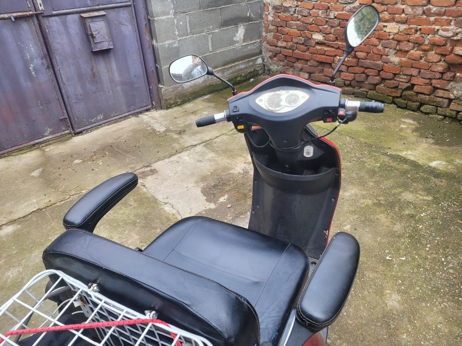 Triciclu electric.