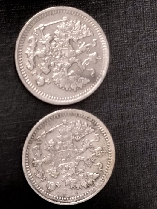 Монеты 2 по 5 копеек.