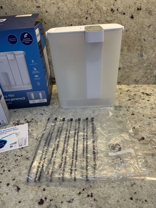 Филтърна кана PHILIPS с четири касетъчни филтъра