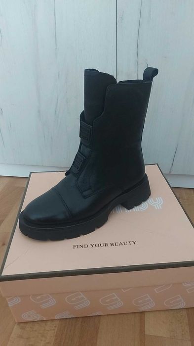 Продам сапоги новые