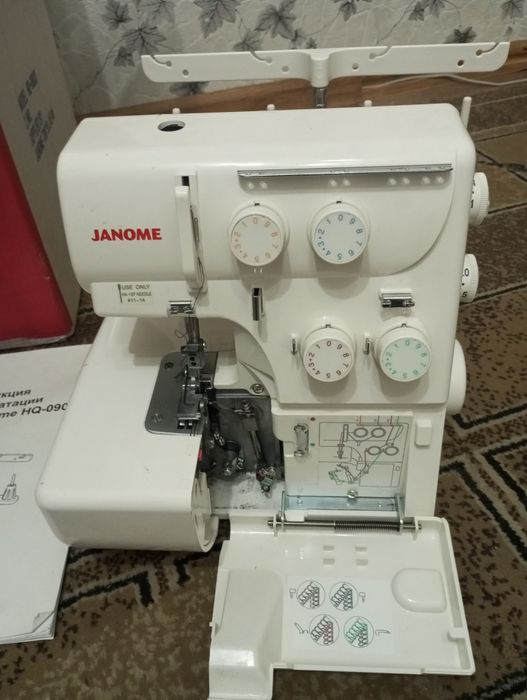 Продам Оверлок Janome HQ-090D белый