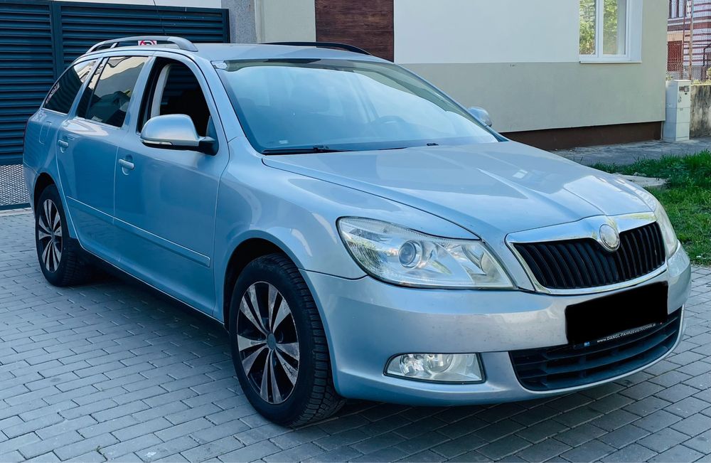 Skoda Octavia - 1.6 TDI - Navigatie / Incalzire Scaune - Pilot Automat / Senzori Parcare