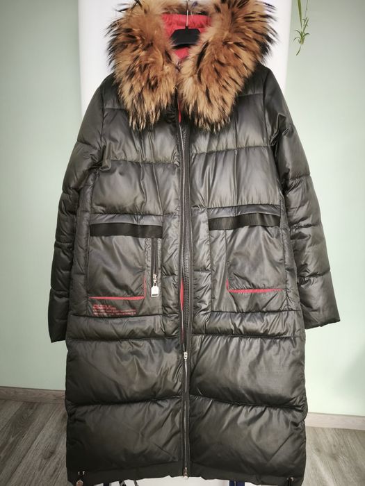 Продам пуховик теплый