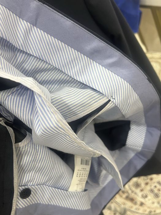 Продам новый костюм