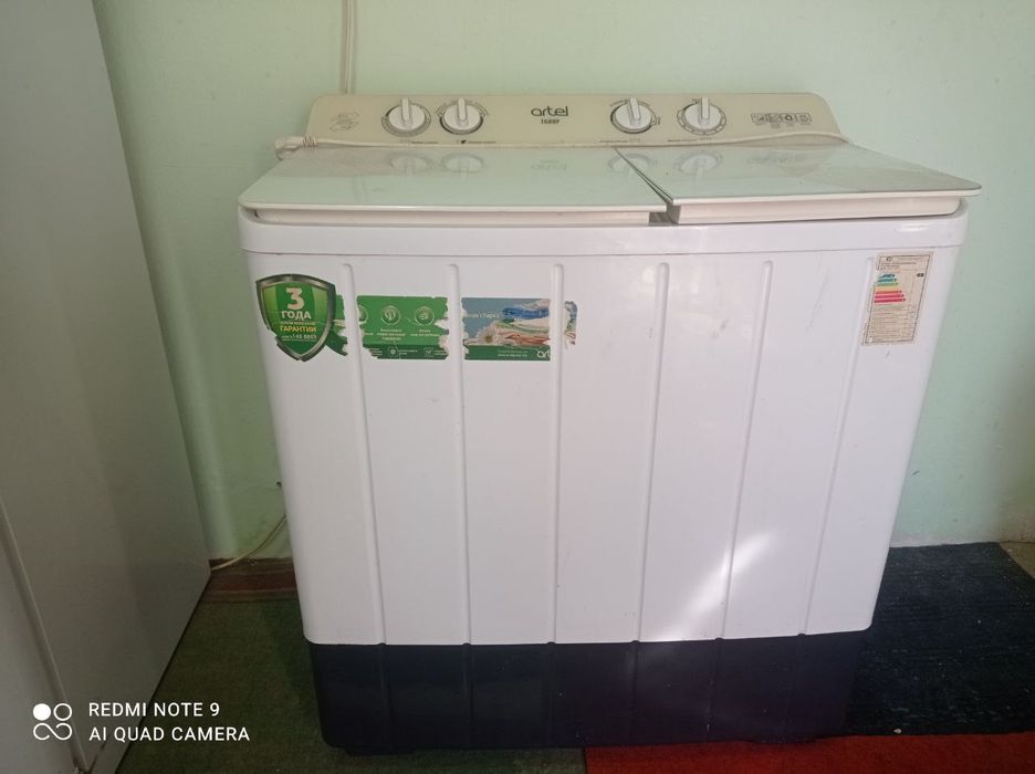 Yarim avtomat kir yuvish mashinasi .