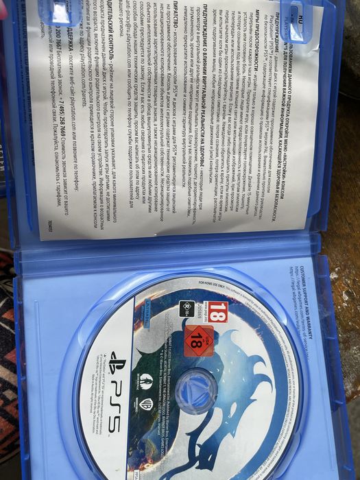 Диски PlayStation Spider-Man и Mortal Kombat