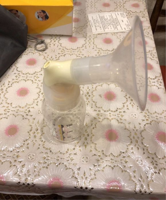 Молокоотсос medela