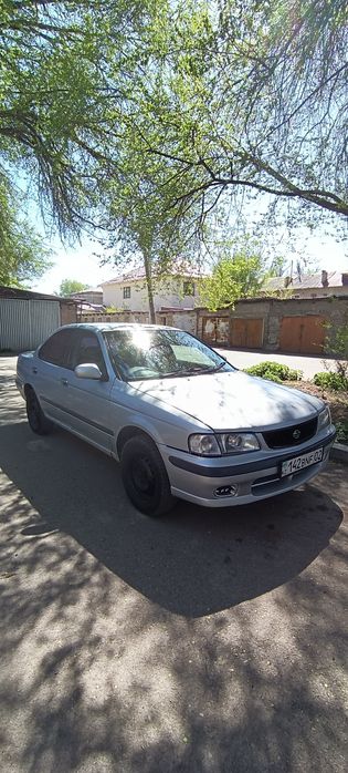 Автомобиль Nissan b15