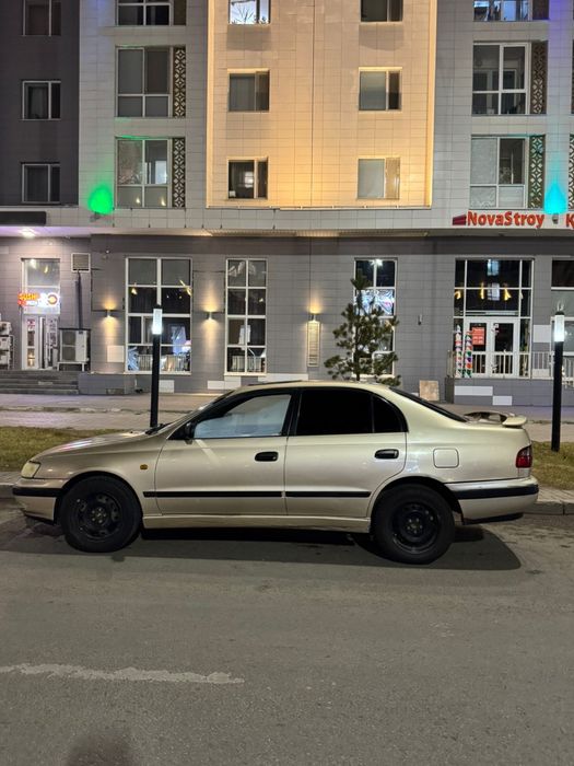 Тайота карина Е 1.6