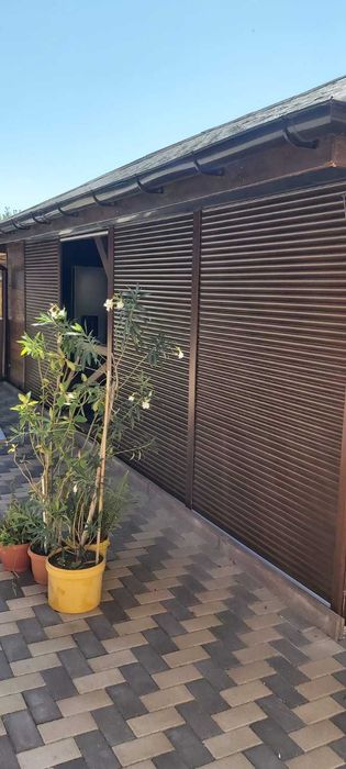 RULOURI Aluminiu si Usi de garaj rezidentiale SECTIONALE