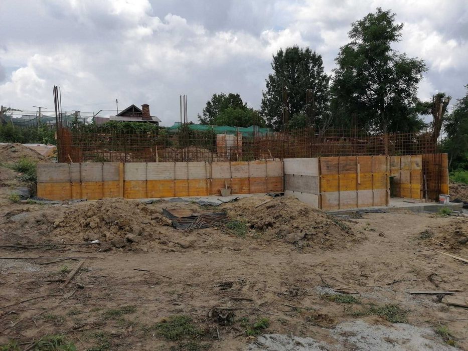 Echipă construcții sau firma