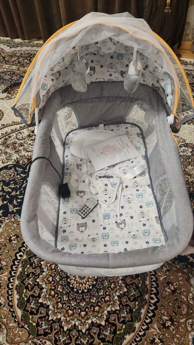 Электронная люлька-шезлонг с пультом — сама укачивает!