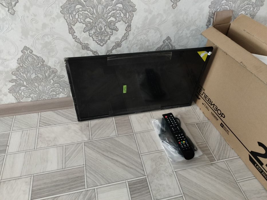 телевизор LED /60 см/ тонкий / новый