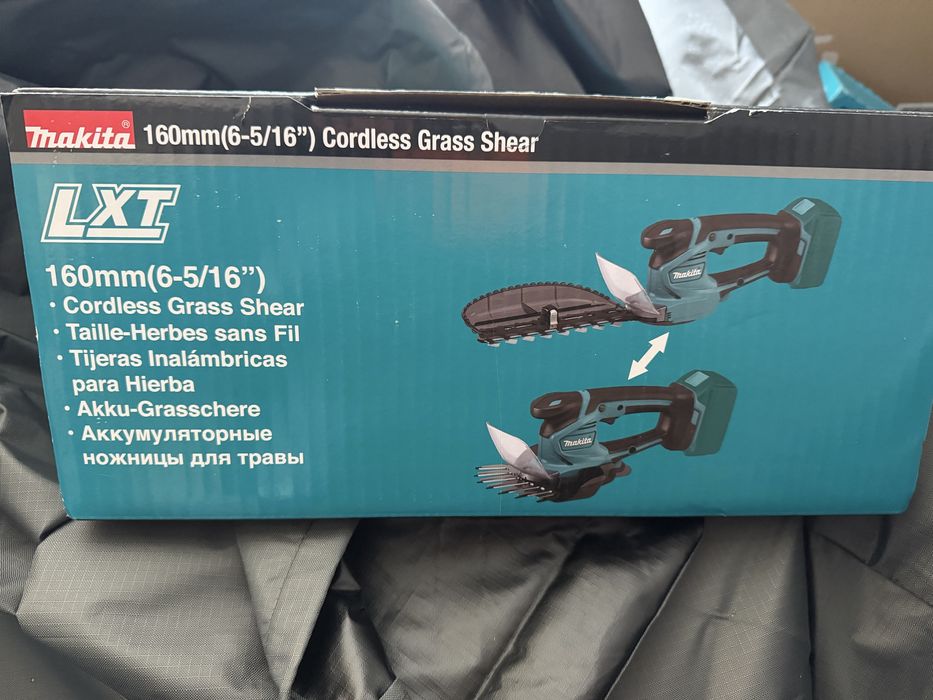 makita DUM604RFX cu incarcator si baterie