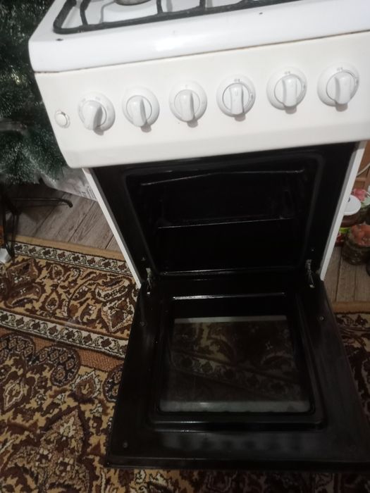 Продам комбинированую плиту