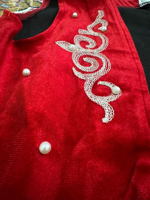 Кажекей  жилетка