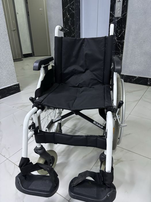 Инвалидная коляска