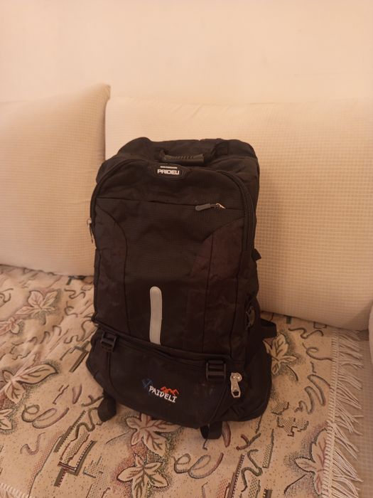 Фирменный рюкзак .