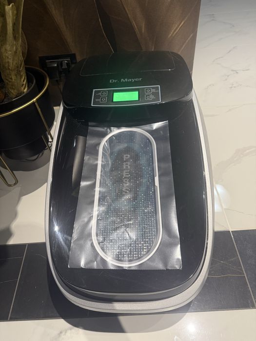 Aparat pentru acoperirea pantofilor  DR.MAYER
