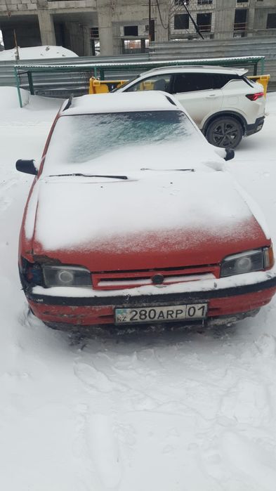 Мазда 323 седан девеностого года механика