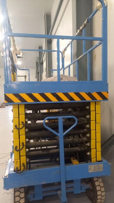 Подъёмник ножнечный