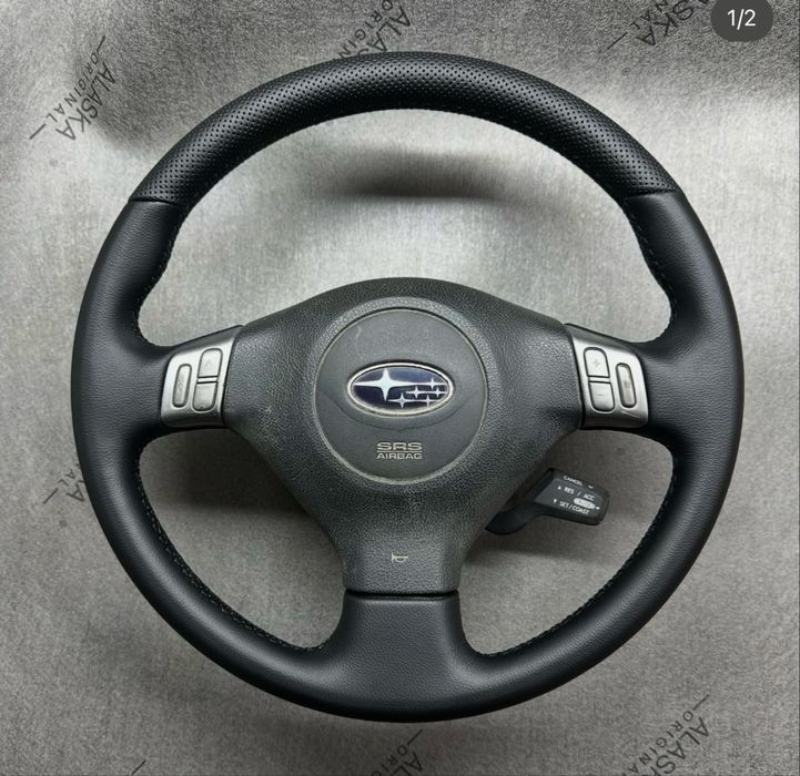 Обшивка руля перетяжка