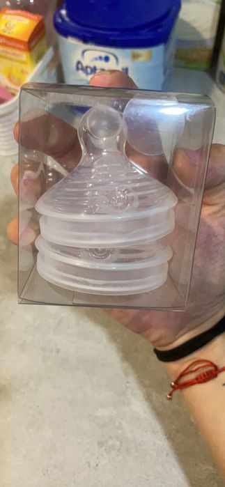 Шише NUK и биберони