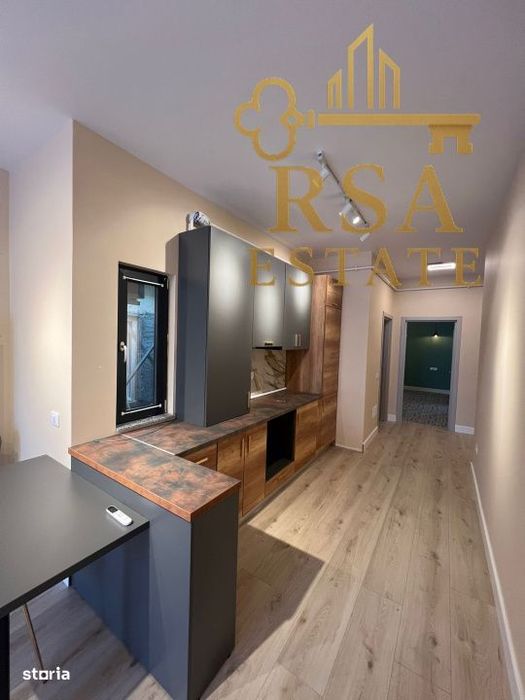 Apartament tip penthouse 2 camere, ultracentral,terasa 25mp-Ramnicu Va — fotografia 2