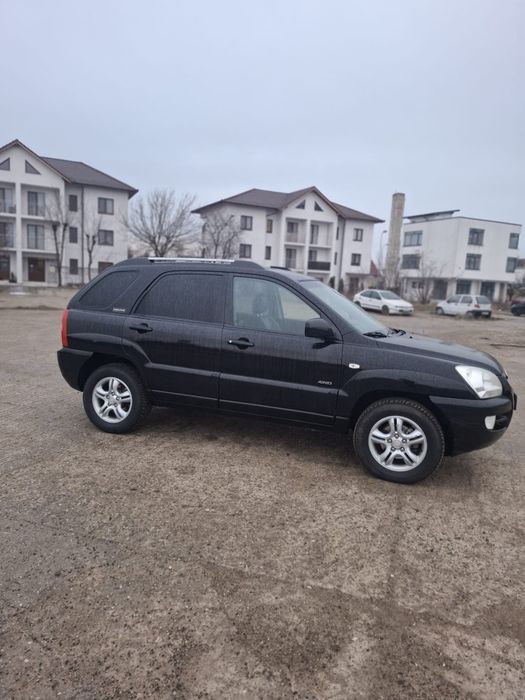 Vând kia sportage