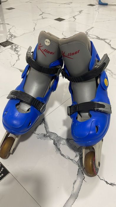 Роликовые коньки