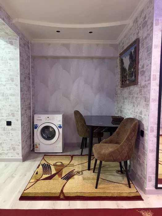 Аренда 1\2 \7 этажка НОВОСТРОЙКА (новая) улица:Ипак йули