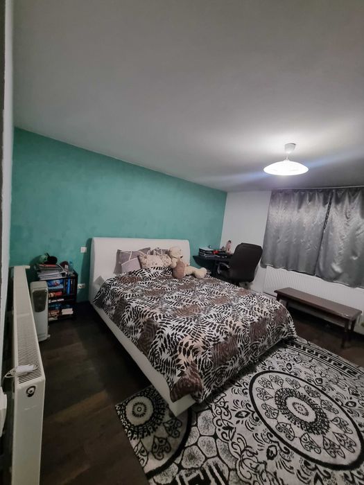 Casă cu Panouri Fotovoltaice si Teren 670 mp