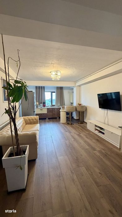 Apartament cu 2 camere, loc de parcare, curte cu loc de joacă, foișor