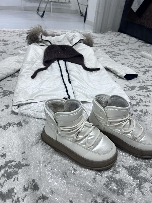 Комбо пуховик сапоги и ушанка