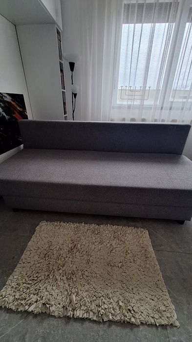Vând canapea extensibila cu lada de depozitare