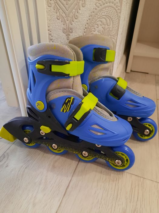 Роликовые коньки новые