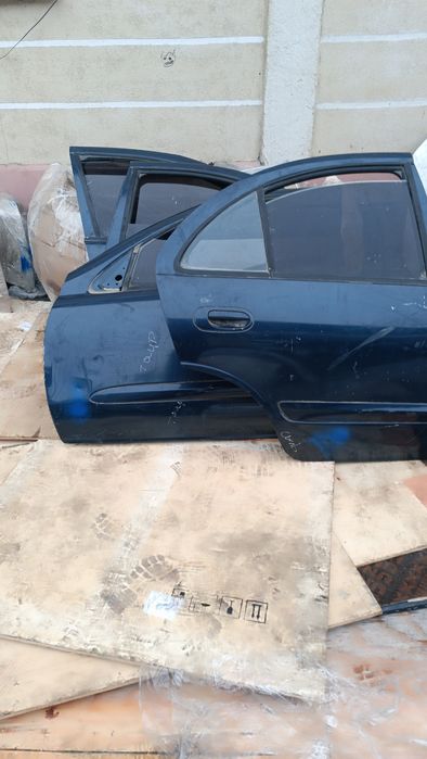 Двери Nissan Almera Classic