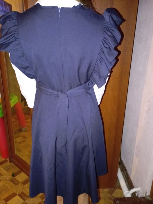 Продам школьный сарафан новый