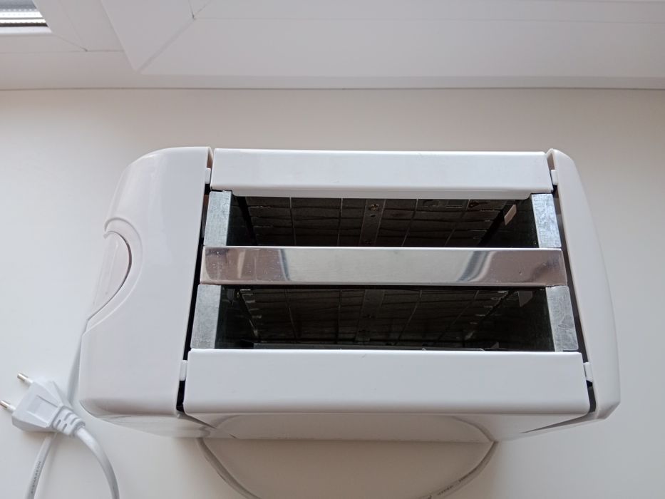 Продам тостерницу NOVA RX 2219C новая