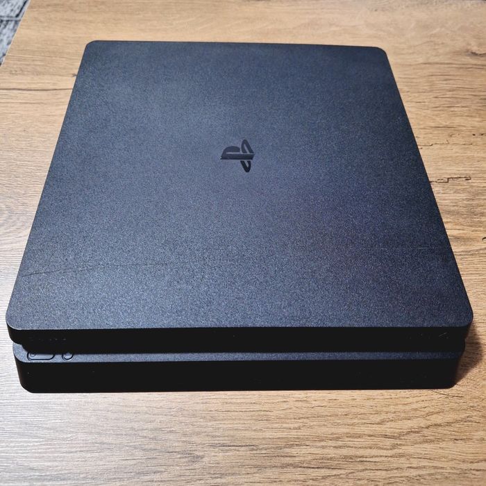 PS4 Slim 1TB + 2 controllere + 2 jocuri (GTA V, FC24) + cabluri