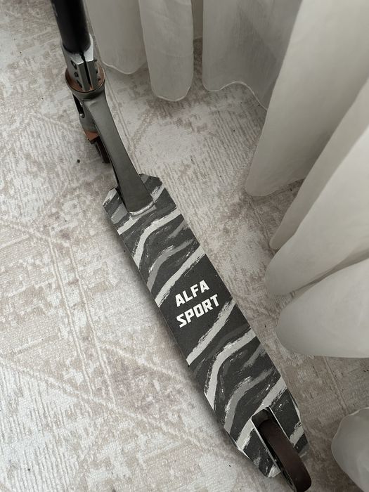 Трюковой самокат