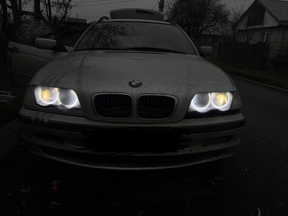 Vând Faruri Bi-xenon cu angel eyes