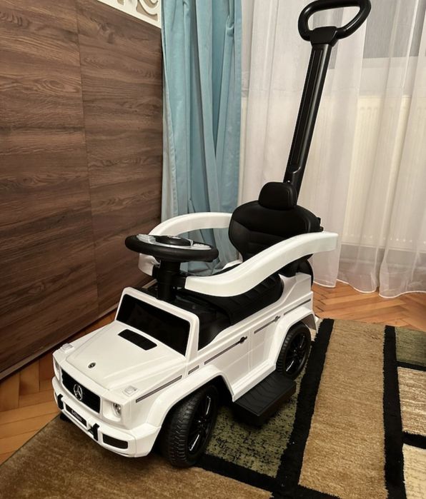 Vand mașinuța cu mâner cu sunete si lumini