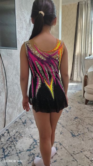 Новый купальник для художественной гимнастики. На рост 135'145см.