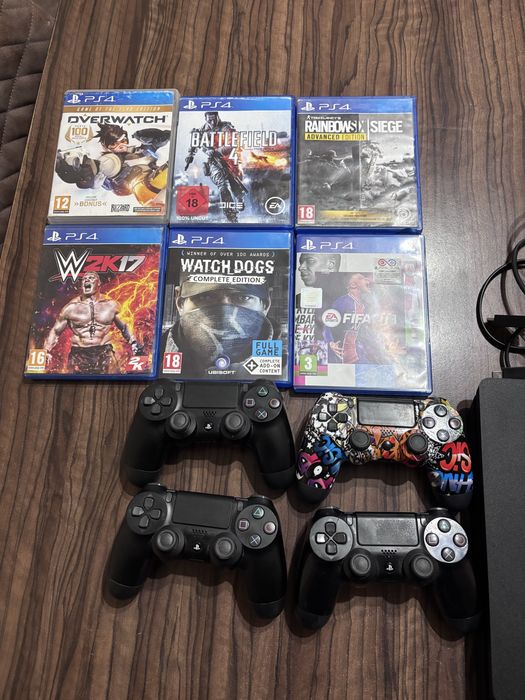 Playstation 4 + 4 controlere si 9 jocuri