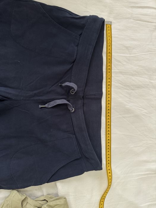 Pantaloni trei sferturi