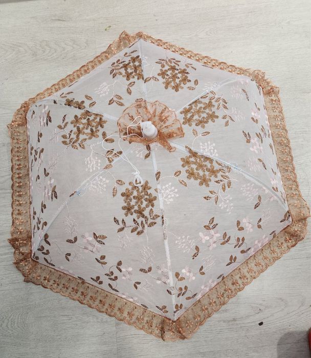 Ovqat va yeguliklarni ustini yopib quyadigan zontik