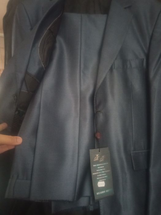 2ta kastyum shim,rangi toq seri va tomniy siniy,holati yengi