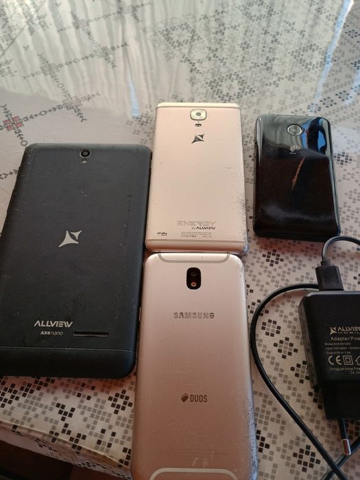 Lot trei telefoane + o tabletă (pentru piese) + Încărcător usbC funcțional