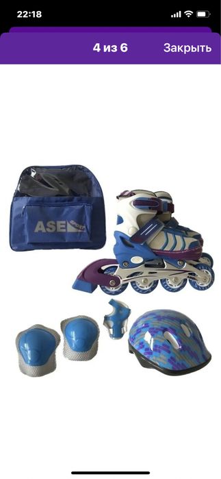 Роликовые коньки